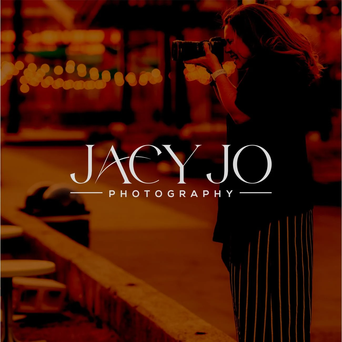 Logo applied over a night event photo
